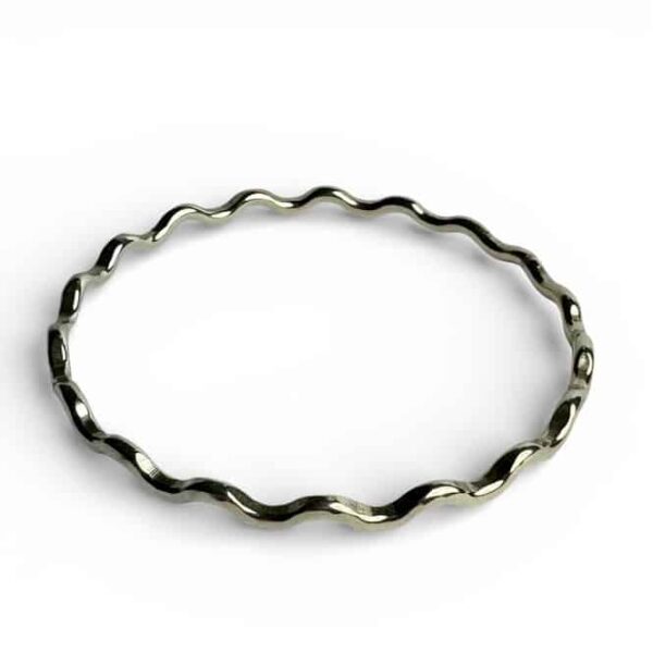 Die formed Sterling silver handmade bangle by Quite Contrary Jewellery