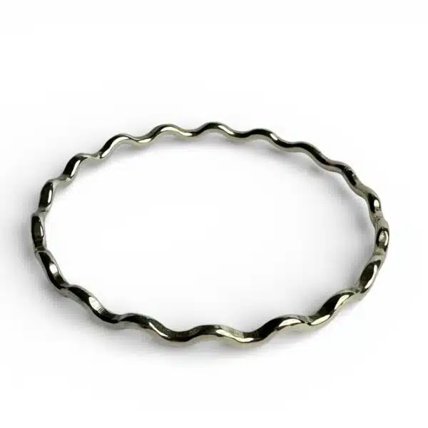 Die formed Sterling silver handmade bangle by Quite Contrary Jewellery