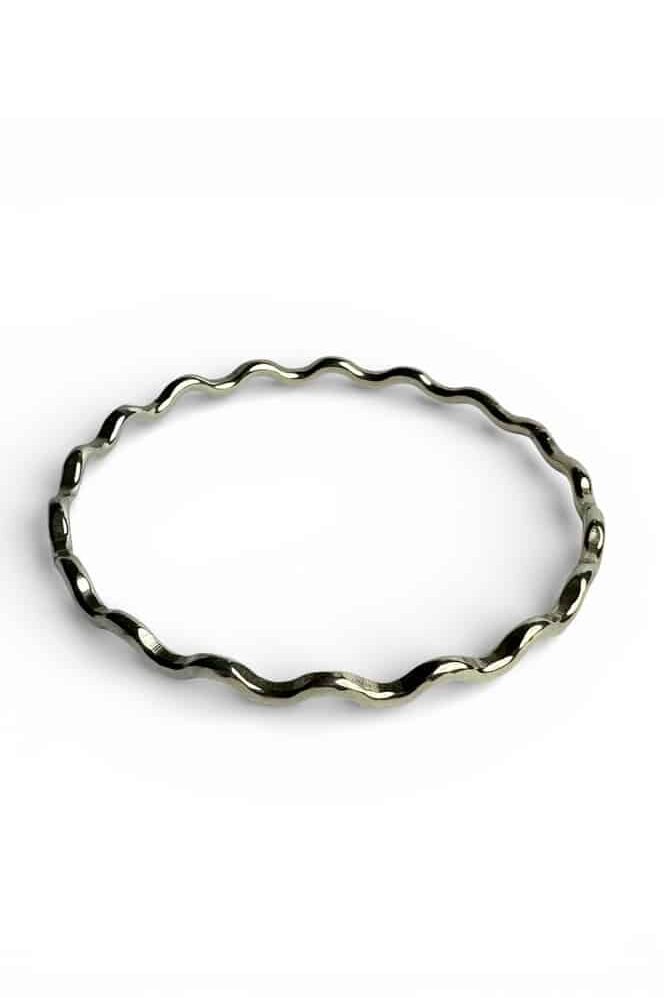 Die formed Sterling silver handmade bangle by Quite Contrary Jewellery