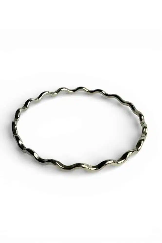 Die formed Sterling silver handmade bangle by Quite Contrary Jewellery