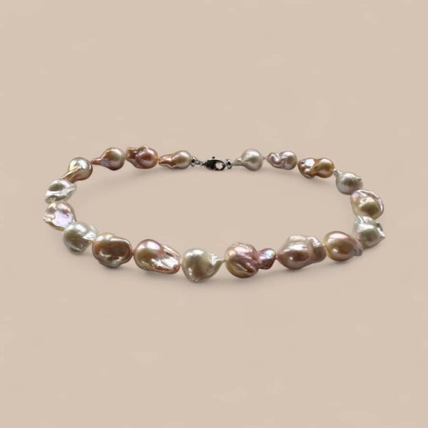 Necklace displaying the subtle natural colours that pearls occur in. Quite Contrary Jewellery