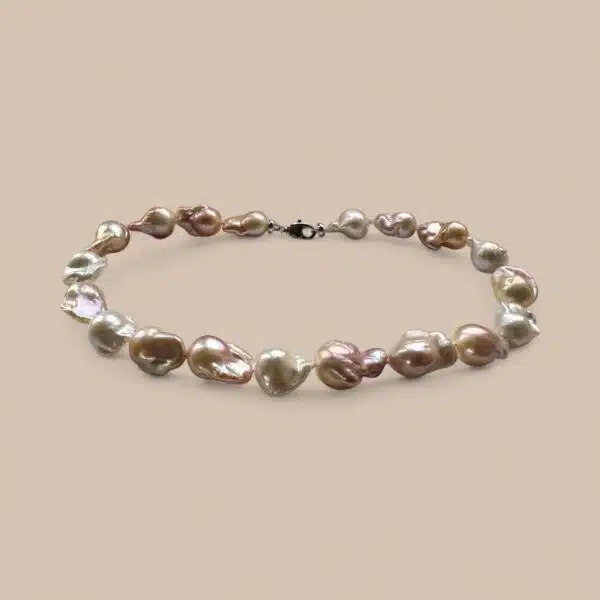 Necklace displaying the subtle natural colours that pearls occur in. Quite Contrary Jewellery