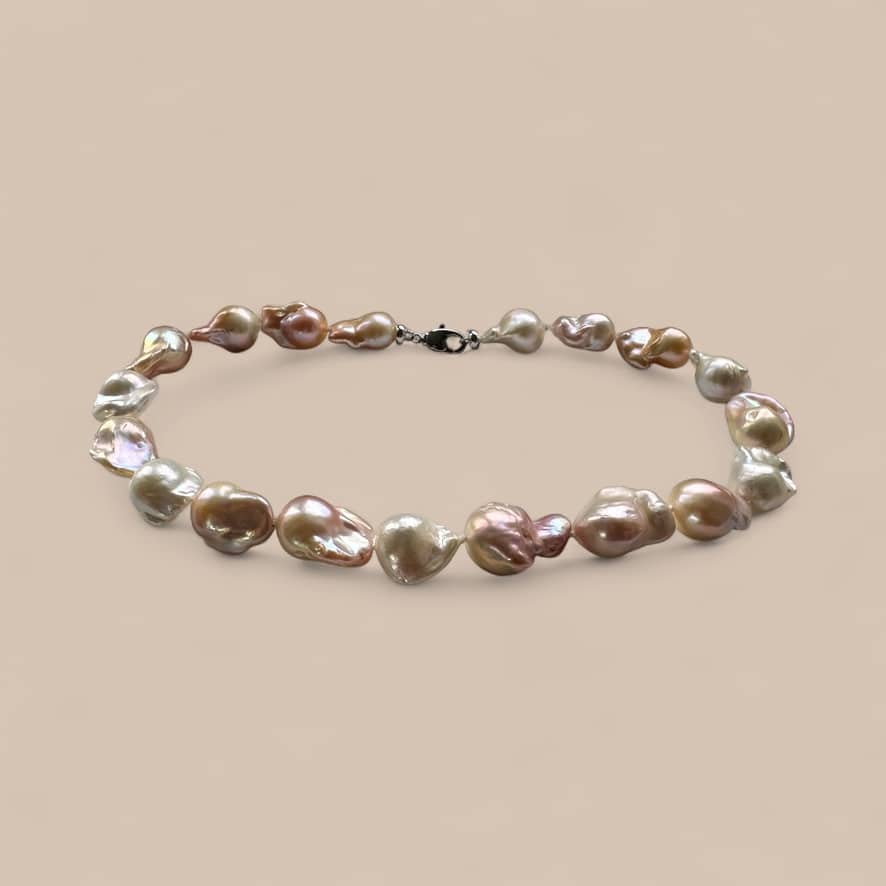 Necklace displaying the subtle natural colours that pearls occur in. Quite Contrary Jewellery