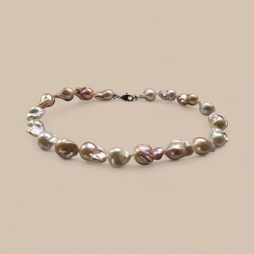 Necklace displaying the subtle natural colours that pearls occur in. Quite Contrary Jewellery