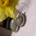 Highland marble cabochons encased in textured sterling silver, suspended from handmade earring hooks. By Ebb & Evergreen