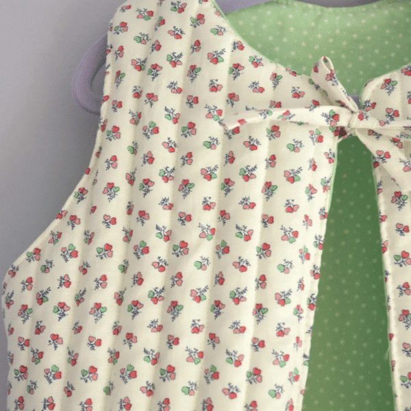 Girls gilet handmade using cream fabric with delicate pink flower print