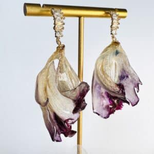 Handcrafted real tulip petal resin earrings on a gold stand by Joie Creations, Canterbury.