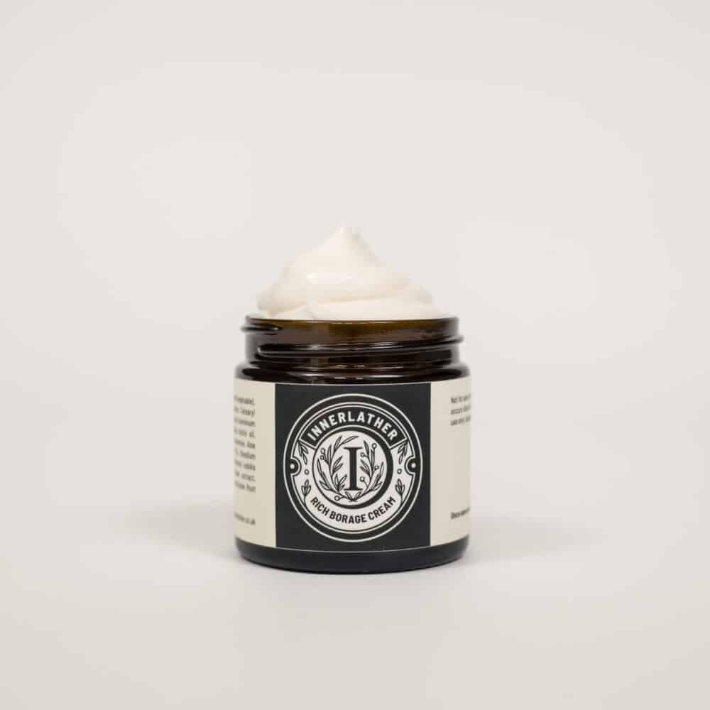 Innerlather: A brown glass squat jar, about 60ml filled to the top with rich borage cream