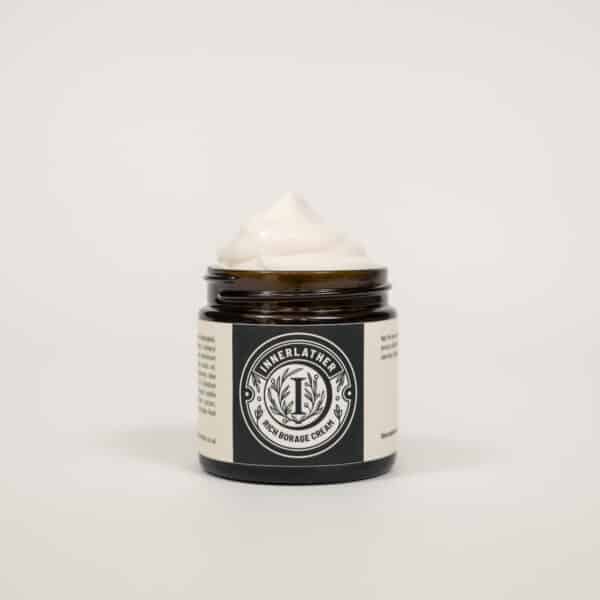 Innerlather: A brown glass squat jar, about 60ml filled to the top with rich borage cream