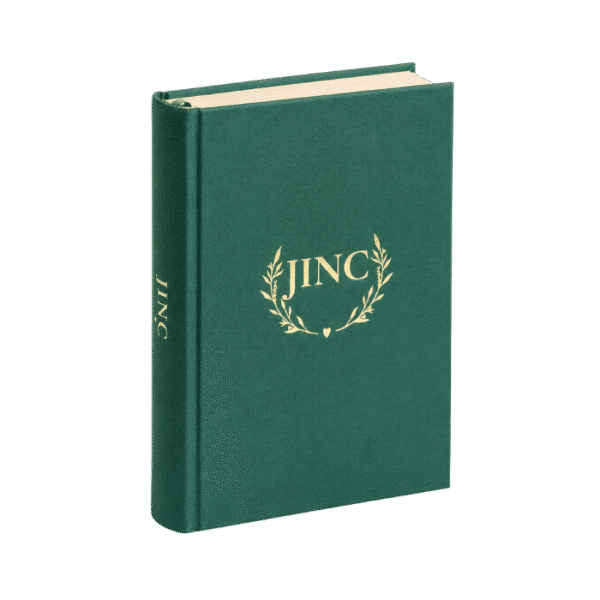 JINC Journal bringing clarity to your family life big - single green journal with JINC logo on.