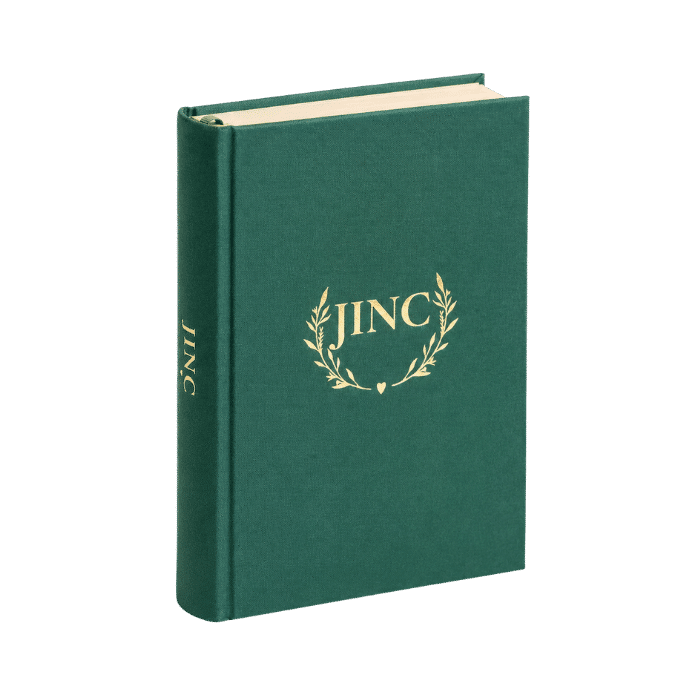 JINC Journal bringing clarity to your family life big - single green journal with JINC logo on.
